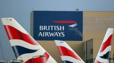 British Airways owner slashes first-quarter loss