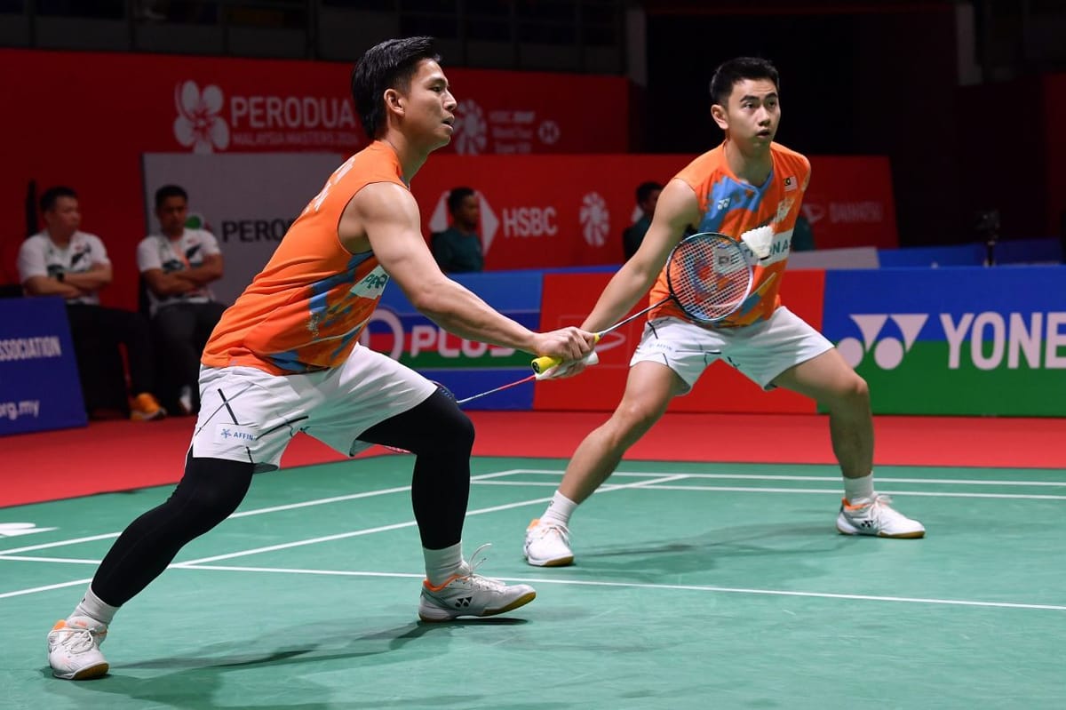 Sze Fei-Izzuddin smash their way into last eight in Singapore