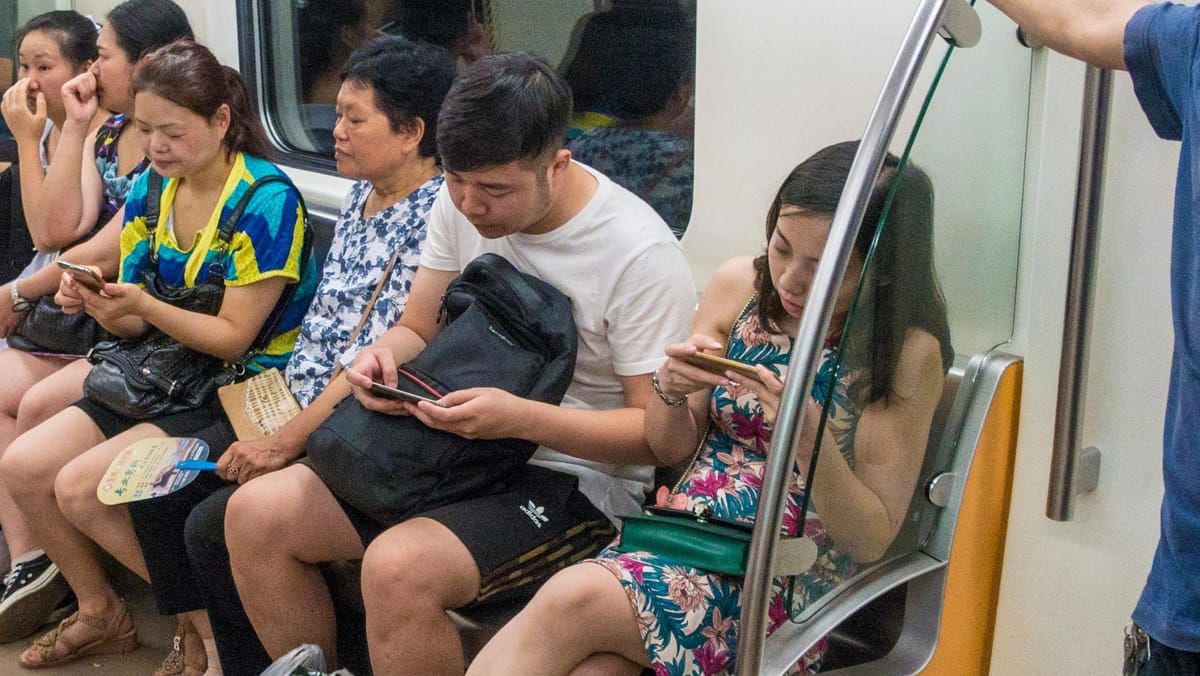 "NO TOUCHING! NO TOUCHING!"  --  Man shouts at LRT passenger for "tapping" his wife on her back to offer her a seat - Singapore News