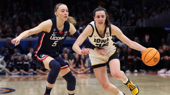 Iowa survives a battle with Connecticut, returns to national title game