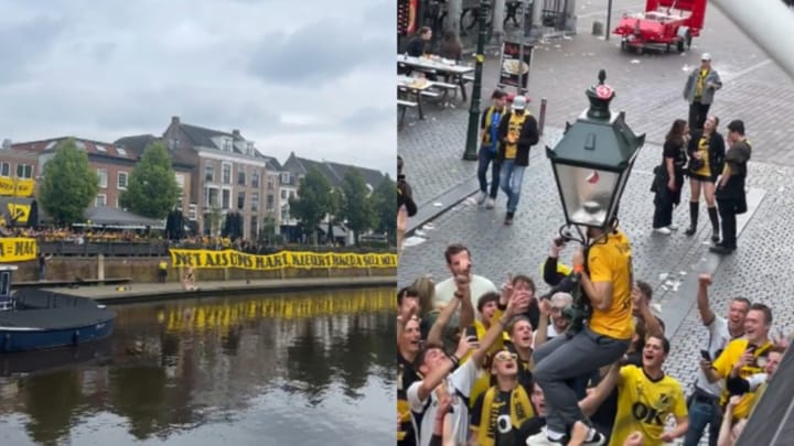 NAC-speler Koscelník springt de haven in en beklimt lantaarnpaal bij promotiefeest