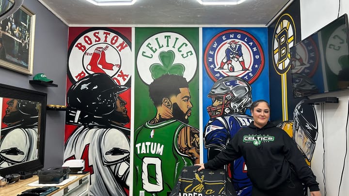 Cranston woman paints New England sports mural in barber shop